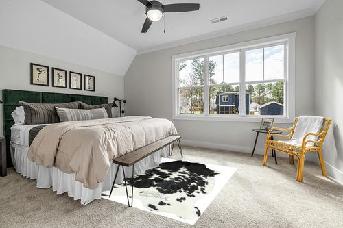 HIDES BAZAAR Classic Black and White Cowhide Rug, Premium Quality Genuine Leather Cow Hide, Area Rug (6x7 ft) in Grey Traditional Bedroom with King Bed