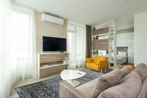 SAFAVIEH Valencia Collection Area Rug - 8' x 10', Blue, Vintage Oriental Design, Non-Shedding & Easy Care, Ideal for High Traffic Areas in Living Room, Bedroom (VAL570M) in Light Modern Living Room with TV