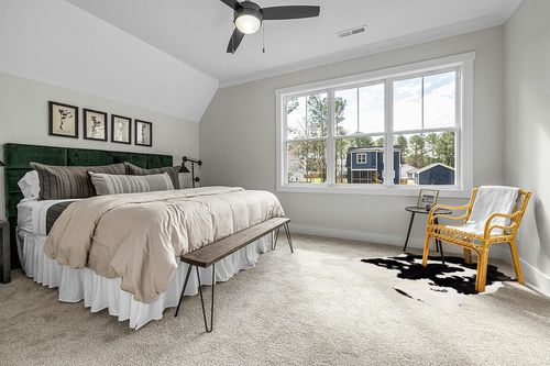 Cowhides Direct Genuine Cowhide Rug - Black & White Rug for Living Room, Bedroom & More - Authentic Cow Rug (6’x6’ Black & White) in Grey Traditional Bedroom with King Bed