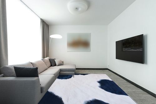 Safavieh Faux Hide Collection Area Rug - 8' x 10', Ivory & Dark Blue, Tiger Print Design, Non-Shedding & Easy Care, Machine Washable Ideal for High Traffic Areas in Living Room, Bedroom (FAH548A) in Modern Living Room with Grey Couch