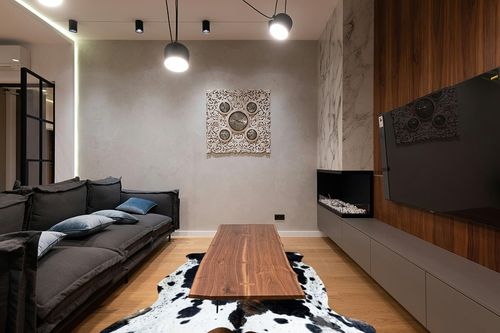 bonanza leathers Genuine Cowhide Rug Dark Tricolor Size S/L/XL 5X6/6X7/7X8 FT (XL) in Dark Wood Living Room with Black Couch