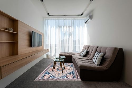 nuLOOM Nevaeh Machine Washable Bohemian Medallion Area Rug in Grey Living Room with Brown Couch