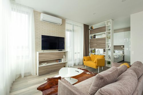 Sunshine Cowhides Genuine Brindle Tricolor Cowhide Rug - Luxurious Cow Rug for Bedroom, Living Room, and Home Decor Enthusiasts - Masterpiece of Style and Functionality - XL 6x7-8ft (180x220cm) in Light Modern Living Room with TV