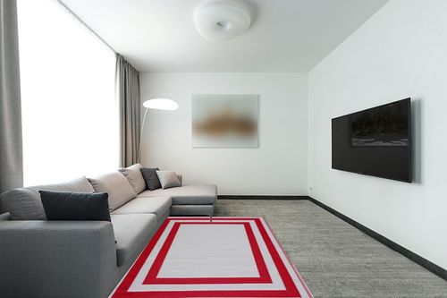 Playa Outdoor Rug - Crease-Free Recycled Plastic Floor Mat for Patio, Camping, Beach, Balcony, Porch, Deck - Weather, Water, Stain, Lightweight, Fade and UV Resistant - Paris- Red & White (5'x7') in Modern Living Room with Grey Couch
