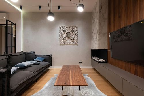 Genuine Grey Beige Cowhide Rug XL 6 x 7-8 ft. 180 x 240 cm in Dark Wood Living Room with Black Couch