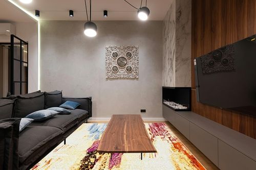 SAFAVIEH Metro Collection Modern Abstract Weathered Watercolor Area Rug, 9' 0" x 12' 0", Ivory/Yellow in Dark Wood Living Room with Black Couch