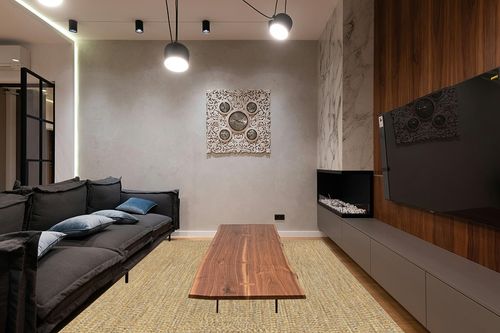 nuLOOM Wynn Braided Indoor/Outdoor Area Rug, 8x10, Yellow in Dark Wood Living Room with Black Couch