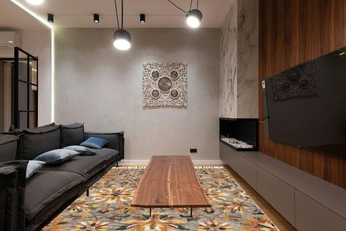 Safavieh Aspen Collection Area Rug - 8' x 10', Grey & Brown, Handmade Floral Tassel Wool, Ideal for High Traffic Areas in Living Room, Bedroom (APN139G) in Dark Wood Living Room with Black Couch