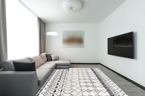 SAFAVIEH Tulum Collection Area Rug - 8' x 10', Ivory & Black, Moroccan Boho Distressed Design, Non-Shedding & Easy Care, Ideal for High Traffic Areas in Living Room, Bedroom (TUL229B) in Modern Living Room with Grey Couch