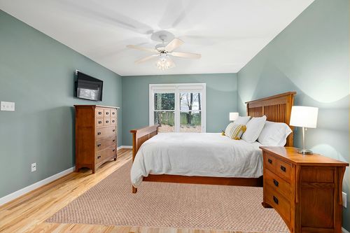 CAMILSON Easy Jute Rug 9x12, Indoor Outdoor Natural Color Farmhouse Area Rugs for Living Room Patio and Kitchen Rug, Solid Boho Woven Design, Easy-Cleaning, Non Slip Washable Outside Carpet (9 x 12) in Teal and Orange Wood Bedroom