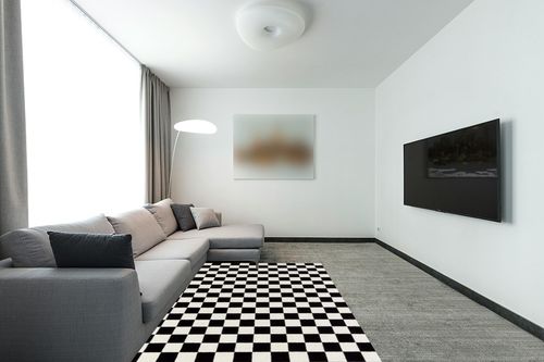 LUXE WEAVERS Checkered Black and White Geometric 5x7 Area Rug in Modern Living Room with Grey Couch