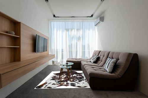 Sunshine Cowhides Genuine Tricolor Spotted Cowhide Rug - Luxurious Cow Rug for Bedroom, Living Room, and Home Decor Enthusiasts - Masterpiece of Style and Functionality - 6x6-7ft (180x210cm) in Grey Living Room with Brown Couch