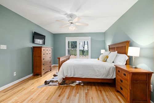 ecowhides 100% Genuine Brazilian Cowhide Rug - Tricolor, Brown, Black & White - Luxury Cowskin Leather Area Rug Decor, (X-Large) 7 x 6 ft in Teal and Orange Wood Bedroom