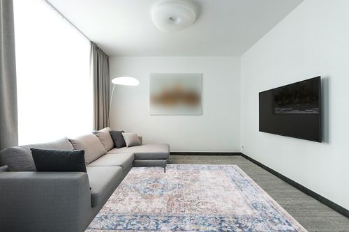 Bloom Rugs Caria Washable Non-Slip 8x10 Rug - Beige/Ocean Blue Traditional Area Rug for Living Room, Bedroom, Dining Room, and Kitchen - Exact Size: 7'8" x 10' in Modern Living Room with Grey Couch