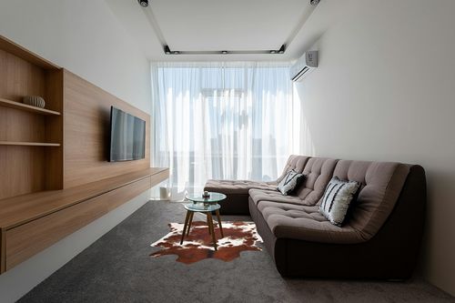 LYENDOS Cowhide Rug 5.2 x 6.2Feet,Cow Hide Rug Durable No-Slip Backing,Faux Cowhide Rug Thickened Elastic,for Bedroom Living Room Home Office Western Decor in Grey Living Room with Brown Couch