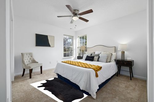 Gaucho Cowhides Solid Black Cowhide Rug - Natural Product in White and Yellow Modern Bedroom
