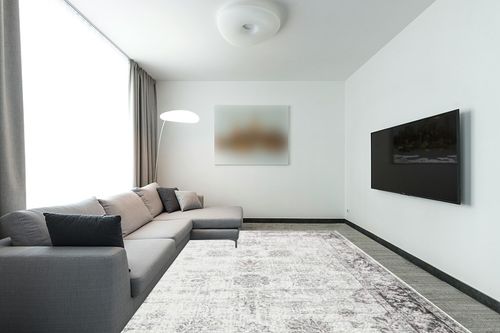 Unique Loom Sofia Collection Area Rug - Casino (9' x 12' Rectangle, Gray) in Modern Living Room with Grey Couch