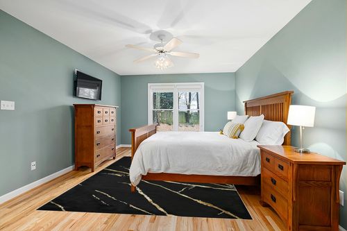 Antep Rugs Babil Gold 8x10 Marble Abstract Modern Indoor Area Rug (Black, 7'10" x 10') in Teal and Orange Wood Bedroom