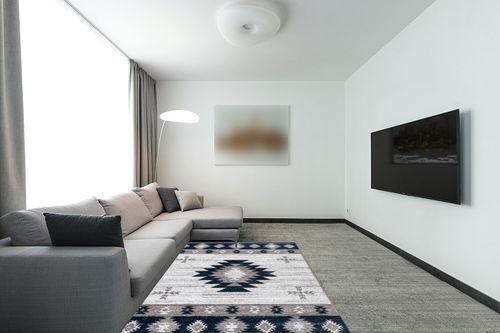 Well Woven Southwestern Rodrigo 5'3" x 7'3" Blue Area Rug in Modern Living Room with Grey Couch