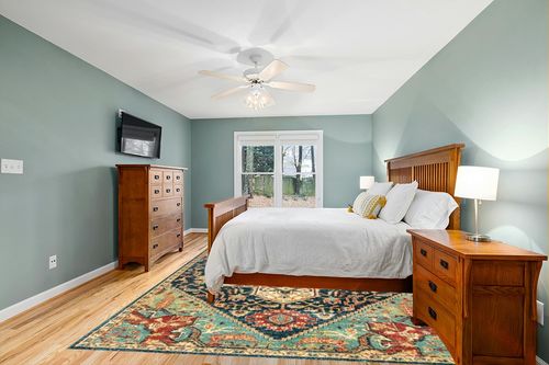 nuLOOM Tabetha Tribal Medallion Area Rug, 8' 10" x 12', Green in Teal and Orange Wood Bedroom