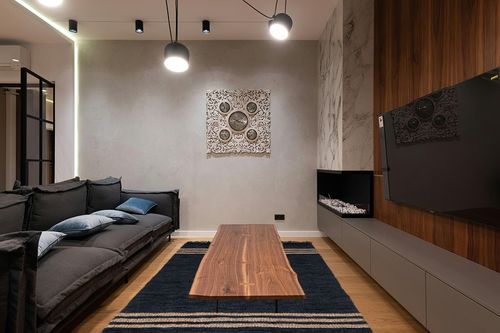 Safavieh Vintage Leather Collection Area Rug - 6' x 9', Black & Beige, Handmade Modern Decorative, Ideal for High Traffic Areas in Living Room, Bedroom (VTL702Z) in Dark Wood Living Room with Black Couch