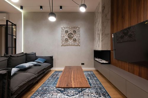 Bloom Rugs 6 x 10 Rug - Teal/Tan Traditional Persian Area Rug for Living Room, Bedroom, Dining Room, and Kitchen - Exact Size: 6' x 9' in Dark Wood Living Room with Black Couch