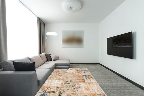 BYYVOO Living Room 6x9 Rug: Modern Abstract Non Slip Area Rug for Bedroom Ultra Soft Stain Resistant Low Pile Indoor Floor Home Decor Carpet 6x9 Gold Multi in Modern Living Room with Grey Couch