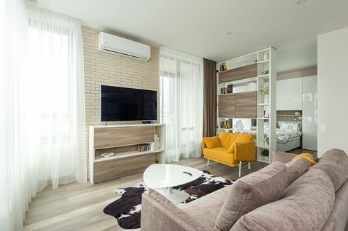 Sunshine Cowhides Genuine Tricolor Cow Skin Leather Cowhide Rug - Luxurious Cow Rug for Bedroom, Living Room, and Home Decor Enthusiasts - Masterpiece of Style and Functionality - XL 6x7-8ft in Light Modern Living Room with TV