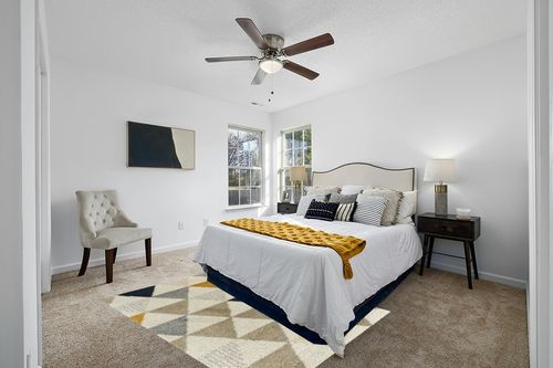 Patao Geometric Ivory/Mustard/Taupe Area Rug Wade Logan Rug Size: Rectangle 5'3" x 7' in White and Yellow Modern Bedroom