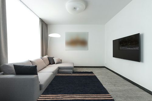 Safavieh Vintage Leather Collection Area Rug - 6' x 9', Black & Beige, Handmade Modern Decorative, Ideal for High Traffic Areas in Living Room, Bedroom (VTL702Z) in Modern Living Room with Grey Couch