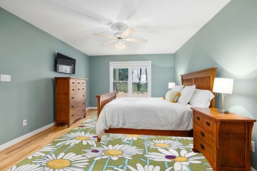 Saegertown Floral Green Area Rug Lark Manor Rug Size: Rectangle 10' x 14' in Teal and Orange Wood Bedroom