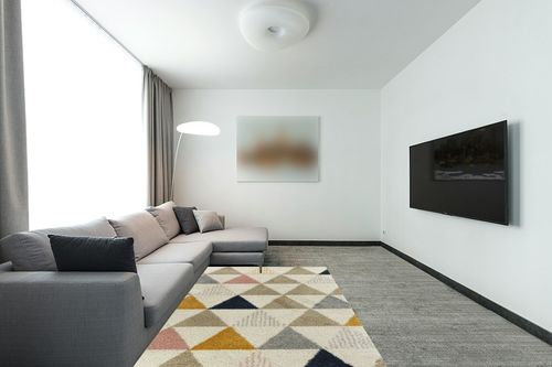 Patao Geometric Ivory/Mustard/Taupe Area Rug Wade Logan Rug Size: Rectangle 5'3" x 7' in Modern Living Room with Grey Couch