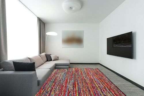 Cotton Multi Chindi Hand Woven Rugs THE BEER VALLEY in Modern Living Room with Grey Couch