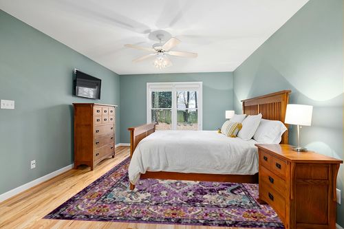 SAFAVIEH Monaco Collection Area Rug - 9' x 12', Violet & Light Blue, Boho Chic Medallion Distressed Design, Non-Shedding & Easy Care, Ideal for High Traffic Areas in Living Room, Bedroom (MNC243L) in Teal and Orange Wood Bedroom