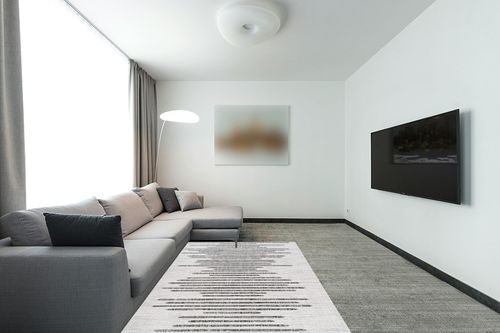 JONATHAN Y SMB124D-5 Zolak Berber Stripe Geometric Indoor Outdoor Area Rug Bohemian Contemporary Easy Cleaning Bedroom Kitchen Backyard Patio Non Shedding, 5 X 8, Ivory/Black in Modern Living Room with Grey Couch