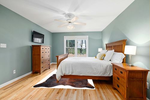 Genuine Brindle Dark Reddish Cowhide Rug XL Size 6 x 7-8 ft. 180 x 240 cm in Teal and Orange Wood Bedroom