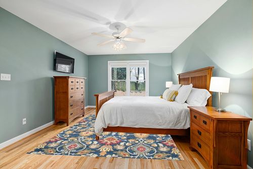 SAFAVIEH Blossom Collection Area Rug - 8' x 10', Navy & Multi, Handmade Wool, Ideal for High Traffic Areas in Living Room, Bedroom (BLM402A) in Teal and Orange Wood Bedroom