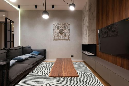 LUXE WEAVERS Le Monde Collection 8505 Anthracite 8x10 Geometric Marble Swirl Area Rug in Dark Wood Living Room with Black Couch