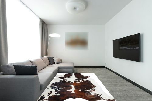 Sunshine Cowhides Genuine Tricolor Cowhide Rug - Luxurious Cow Rug for Bedroom, Living Room, and Home Decor Enthusiasts - Masterpiece of Style and Functionality - 6x6-7ft (180x210cm) in Modern Living Room with Grey Couch
