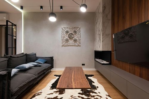 Loloi II Grand Canyon Collection GC-05 Beige/Brown, Transitional 6'-2" x 8' Area Rug in Dark Wood Living Room with Black Couch