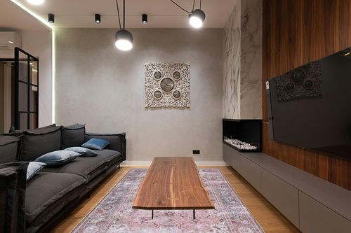 SAFAVIEH Tucson Collection Area Rug - 6' x 9', Pink & Beige, Persian Design, Non-Shedding Machine Washable & Slip Resistant Ideal for High Traffic Areas in Living Room, Bedroom (TSN144U) in Dark Wood Living Room with Black Couch