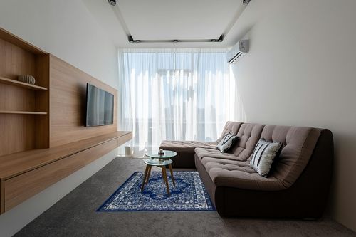Antep Rugs Oriental 5x7 Traditional Medallion Indoor Area Rug Siesta (Navy Blue, 5'3" x 7') in Grey Living Room with Brown Couch