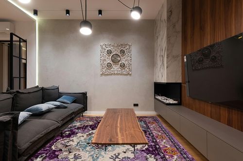 SAFAVIEH Monaco Collection Area Rug - 9' x 12', Violet & Light Blue, Boho Chic Medallion Distressed Design, Non-Shedding & Easy Care, Ideal for High Traffic Areas in Living Room, Bedroom (MNC243L) in Dark Wood Living Room with Black Couch