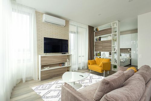 NuLOOM Lola Geometric Shag Area Rug, 5' 3" x 7' 6", White in Light Modern Living Room with TV