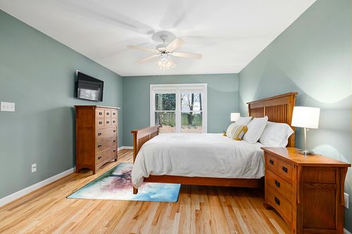 DNOVING Large Non-Slip Area Rug 5x7ft Washable Fluffy Rug, Cherry Blossom Tree Design, Rubber Backing, Pink and White Petals on Blue Sky in Teal and Orange Wood Bedroom
