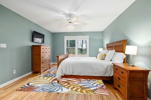 JONATHAN Y AMC100B-8 Tropics Palm Leaves Indoor Outdoor Area-Rug Bohemian Floral Easy-Cleaning High Traffic Bedroom Kitchen Backyard Patio Porch Non Shedding, 8 X 10, Cream/Orange in Teal and Orange Wood Bedroom