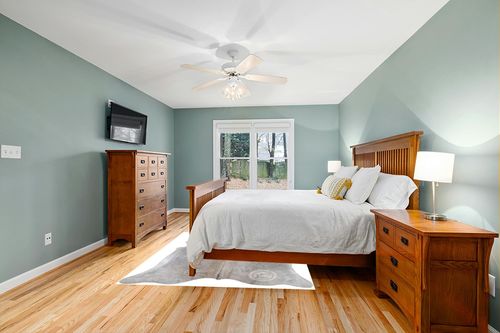 Sunshine Cowhides Genuine Grey Beige Cowhide Rug - Luxurious Cow Rug for Bedroom, Living Room, and Home Decor Enthusiasts - Masterpiece of Style and Functionality - Large - 6x6-7ft (180x220cm) in Teal and Orange Wood Bedroom