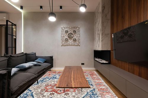 VK Living Washable Rug, in Dark Wood Living Room with Black Couch