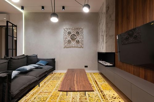 SAFAVIEH Monaco Collection Area Rug - 8' x 11', Yellow & Multi, Modern Patchwork Distressed Design, Non-Shedding & Easy Care, Ideal for High Traffic Areas in Living Room, Bedroom (MNC216K) in Dark Wood Living Room with Black Couch