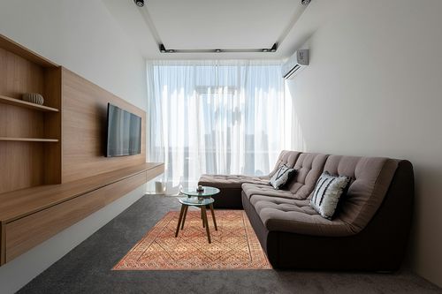 Rugs USA x Prabal Gurung Bagmati Machine Washable Area Rug, 5x8, Orange in Grey Living Room with Brown Couch